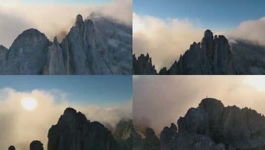 航拍山尖峰上的雾高清在线视频素材下载