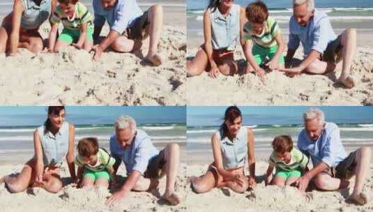 快乐的家庭在海滩上玩沙子高清在线视频素材下载