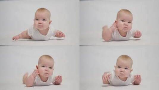 白色背景上心满意足的婴儿肖像高清在线视频素材下载