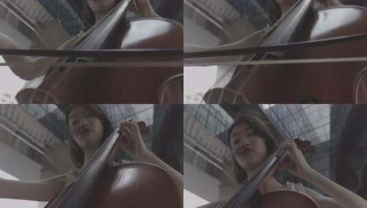 女子演奏大提琴近景高清在线视频素材下载