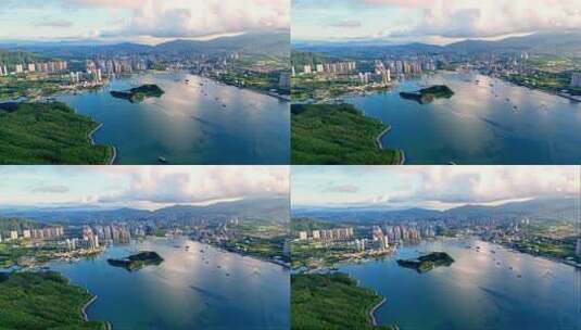 惠州大亚湾山水环绕的城市风光鸟瞰全景高清在线视频素材下载