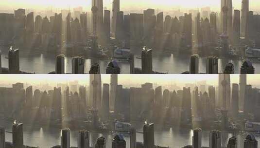 航拍上海陆家嘴建筑特写日出丁达尔效应高清在线视频素材下载