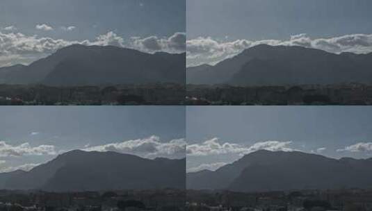 乌云笼罩在一座漆黑的山上高清在线视频素材下载