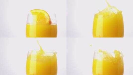 掉进果汁里的橙片高清在线视频素材下载