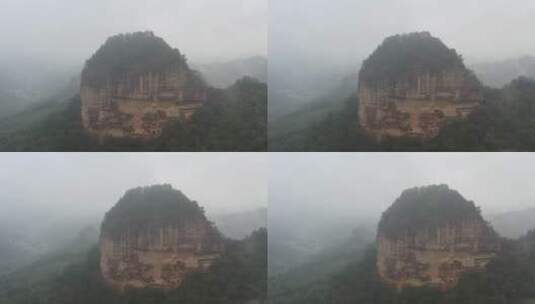 雨雾中的麦积山石窟航拍视频高清在线视频素材下载