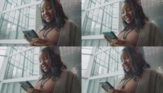 黑人女孩在电梯玩手机高清在线视频素材下载