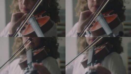 拉小提琴的女人高清在线视频素材下载