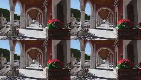 走廊里的鲜花和自行车高清在线视频素材下载