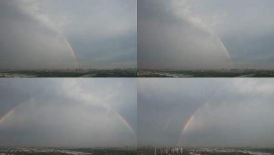 航拍太阳雨后的城市彩虹高清在线视频素材下载