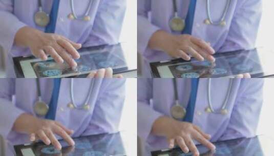 医生使用平板电脑分析患者数据高清在线视频素材下载