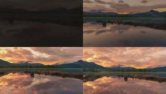 湖水天空夕阳倒影雪山森林水天一色高清在线视频素材下载