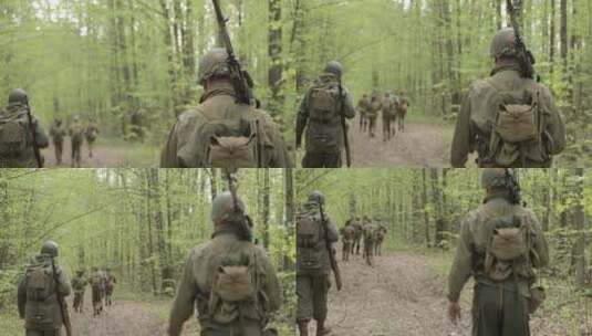 一群士兵在沿着森林道路行进高清在线视频素材下载