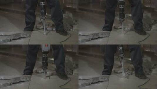 熟练工人用手提钻砸瓷砖高清在线视频素材下载