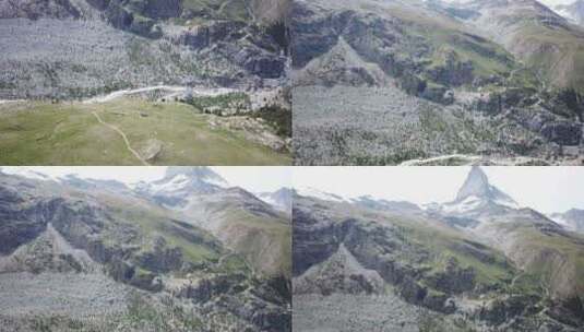 向上倾斜：Cervin上的无人机鸟瞰，蓝天的采尔马特，瑞士阿尔卑斯山重新采购景观，高清在线视频素材下载