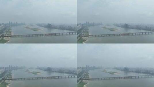 南昌大桥航拍赣江两岸城市建筑风景阴天城市高清在线视频素材下载