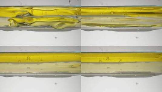 往水中倒入食用油高清在线视频素材下载