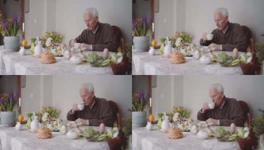 老人坐在复活节彩蛋旁边的一张满桌子旁，用高清在线视频素材下载