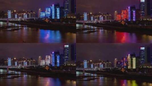 河边灯火通明、闪闪发光的建筑物高清在线视频素材下载