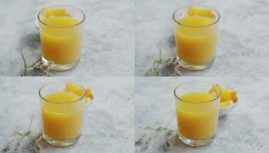 一杯新鲜橙汁特写高清在线视频素材下载