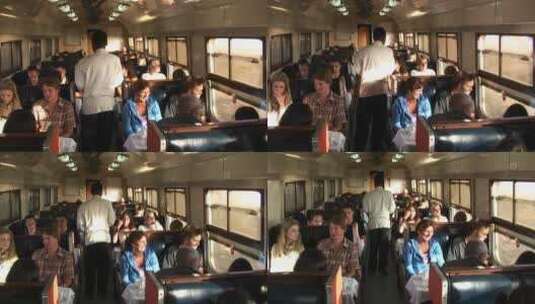 乘务员拿着盘子穿过火车车厢高清在线视频素材下载