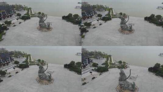 湖南岳阳巴陵广场辛巴斩蛇雕像航拍高清在线视频素材下载