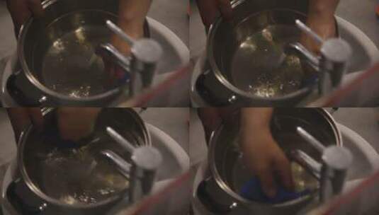 洗手池水龙头刷碗洗碗刷盘子高清在线视频素材下载