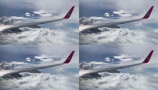 民航拍机翼穿越云层俯拍地面视频高清在线视频素材下载