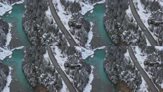 汽车行驶在下雪天帕隆藏布江河谷的川藏公路高清在线视频素材下载