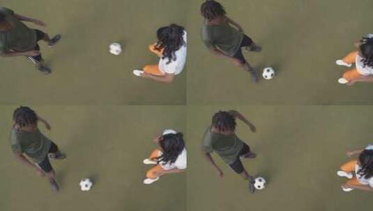 男子和女子足球运动员练习传球高清在线视频素材下载
