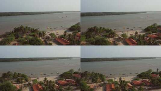空中：巴西北部帕纳巴河三角洲风筝冲浪。高清在线视频素材下载