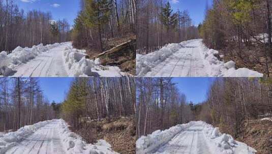 行驶在崎岖颠簸的森林雪路上高清在线视频素材下载