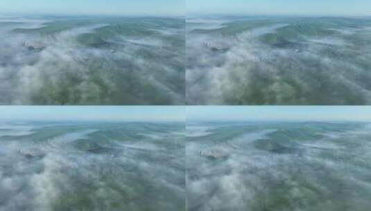 航拍晨雾中的田野乡村高清在线视频素材下载
