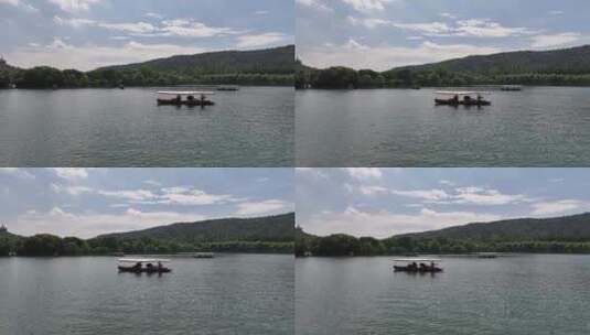 杭州西湖摇橹船手划船 泛舟湖上高清在线视频素材下载