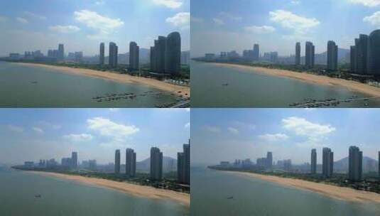 厦门滨海浪漫线海上航拍沙滩和海边高层建筑高清在线视频素材下载