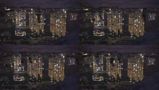 夜晚水面城市建筑倒影路人倒影重庆来福士高清在线视频素材下载
