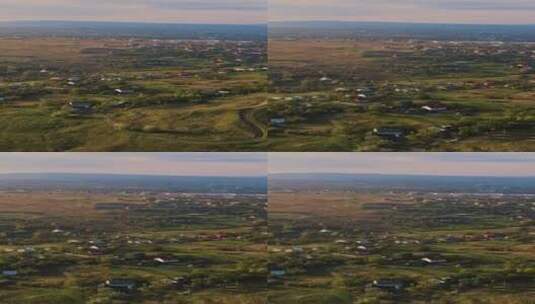 乌克兰西部田野和村庄的风景。鸟瞰图。垂直视频高清在线视频素材下载