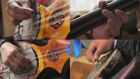 西藏传统乐器弹奏手部特写高清在线视频素材下载