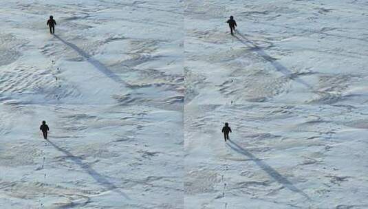 人类行走扔雪原高清在线视频素材下载