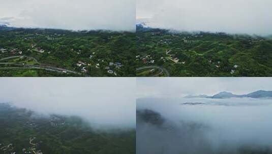 6月大山雨季穿云航拍小县城风光高清在线视频素材下载