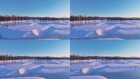 不冻河开阔雪地上有人在活动的景象高清在线视频素材下载