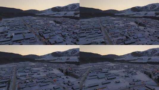 新疆阿勒泰地区禾木村雪景航拍高清在线视频素材下载