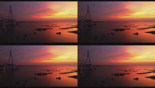 跨海大桥晚霞夕阳渔船海南城市旅游风光02高清在线视频素材下载