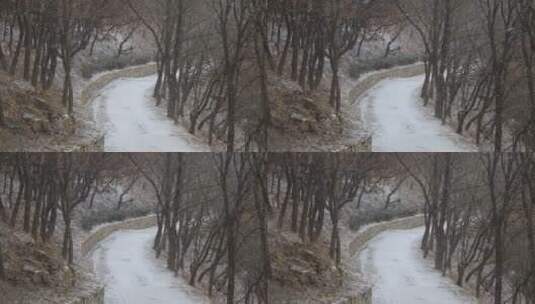威海里口山雪中的山间小路4K高清在线视频素材下载