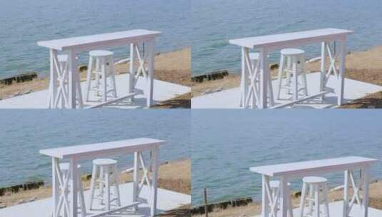 水边的白色桌椅高清在线视频素材下载