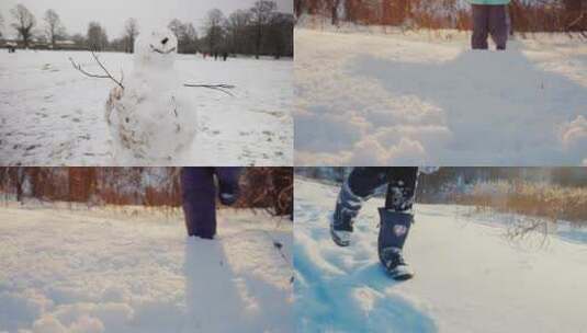 雪地里堆雪人高清在线视频素材下载