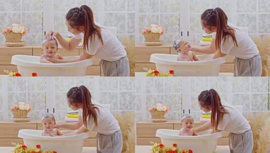 婴儿在浴缸里沐浴高清在线视频素材下载