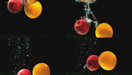 苹果和橙子掉进水里高清在线视频素材下载