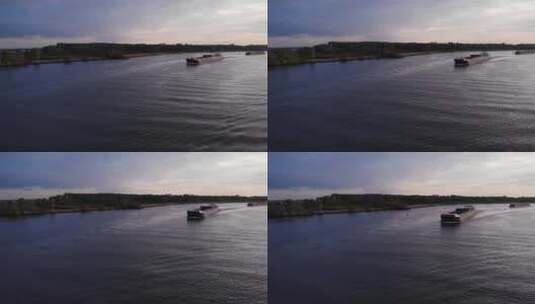 Excelsior航运公司的货船白天在巴伦德雷赫特的河边航行。广角镜头高清在线视频素材下载