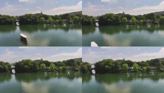 杭州西湖摇橹船手划船 泛舟湖上高清在线视频素材下载