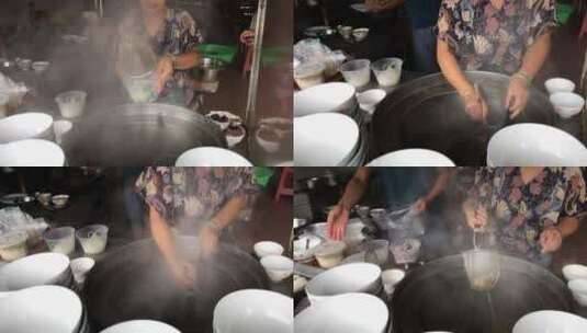 传统美食摊贩做汤粉高清在线视频素材下载